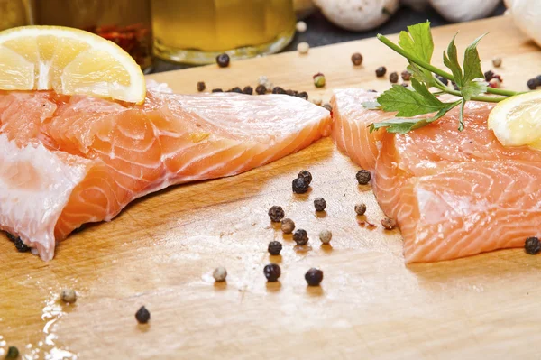 Salmon fillet with rosemary and lemon — Stock Photo, Image