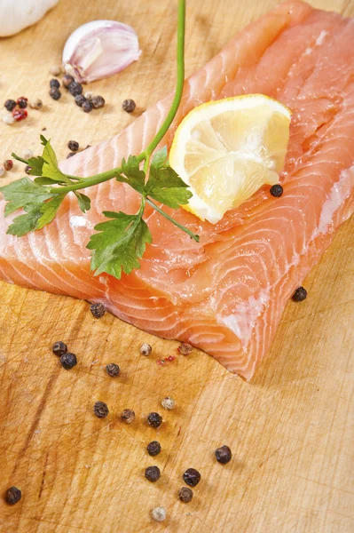 Salmon fillet with rosemary and lemon — Stock Photo, Image
