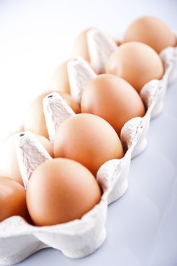 the brown eggs in egg box