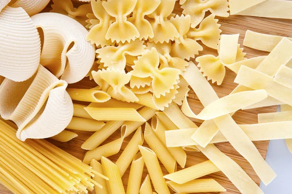 Close up on assortment of uncooked pasta — Stock Photo, Image