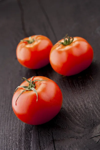 Tomatoes, cooked with herbs for the preservation on the old wood — Stock Photo, Image