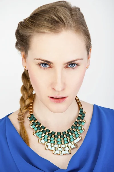 Portrait of young beautiful long-haired blonde woman with neckla — Stock Photo, Image