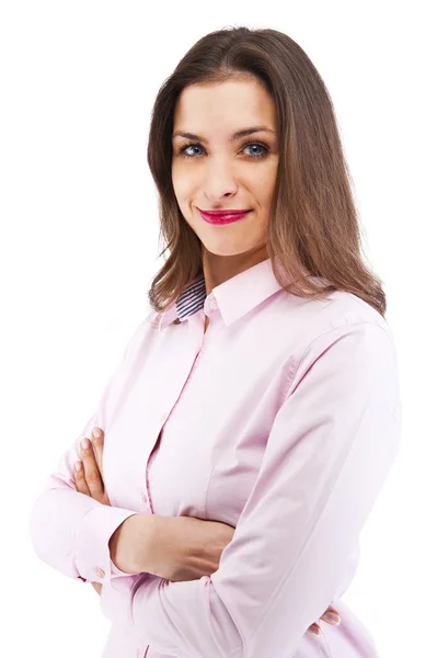 Mujer de negocios sonriente con las manos dobladas contra fondo blanco — Foto de Stock