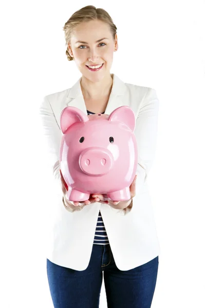 Glückliche Geschäftsfrau hält Sparschwein vor weißem Hintergrund — Stockfoto