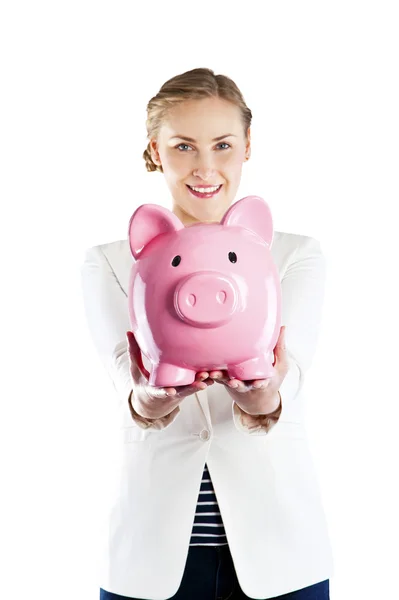 Glad kvinna med hennes besparingar i en spargris isoleted på vita b — Stockfoto