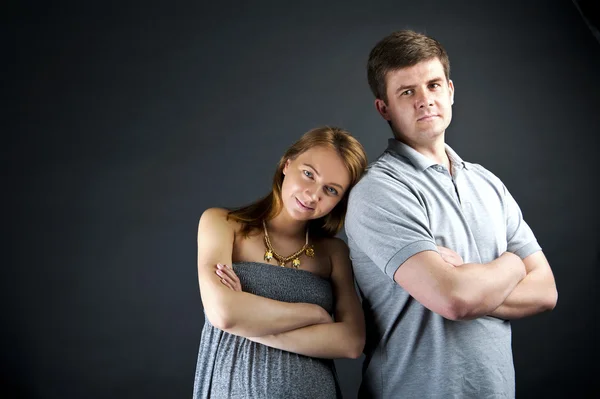 Woman and man togheter over dark background — Stock Photo, Image
