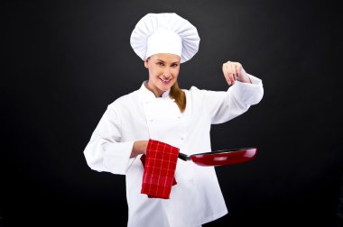 koyu backgroundsmiling ve ckoking Cheff kadın