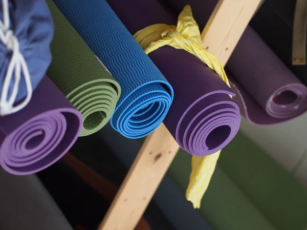 Stuoie di yoga Immagine Stock