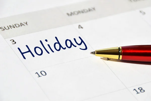 Nota de vacaciones en el calendario — Foto de Stock