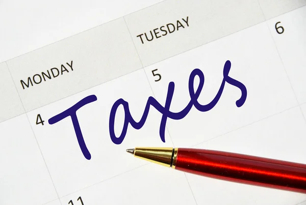 Taxes note in the agenda — Stock Photo, Image