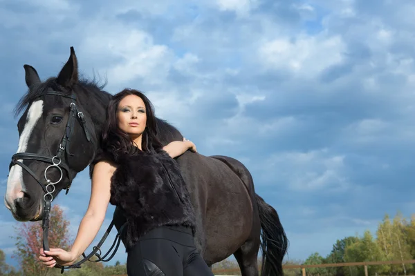 Woman with a horse — Stock Photo, Image