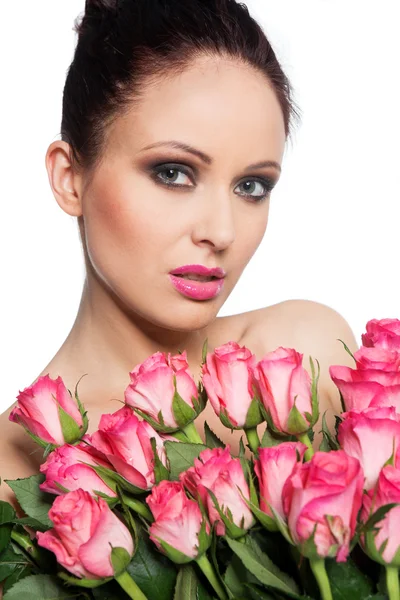 Vrouw met boeket rozen — Stockfoto
