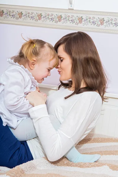 Mother and child having fun at home — Stock Photo, Image