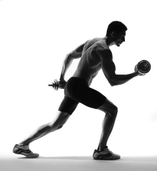 Muscle model guy exercise over white background. — Stock Photo, Image