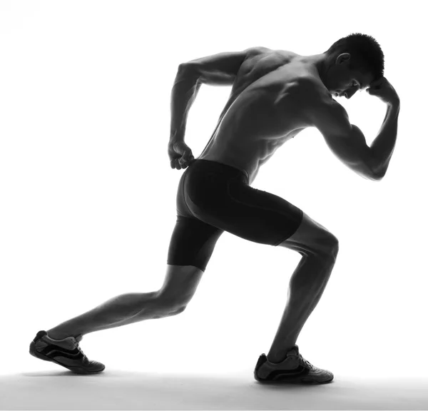 Muscle model guy exercise over white background. — Stock Photo, Image