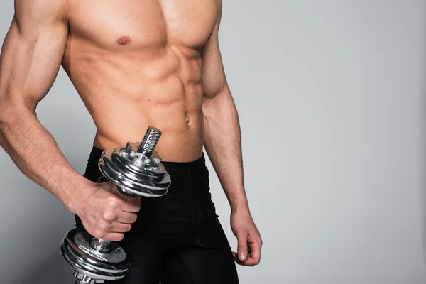 Exercise with dumbbells — Stock Photo, Image