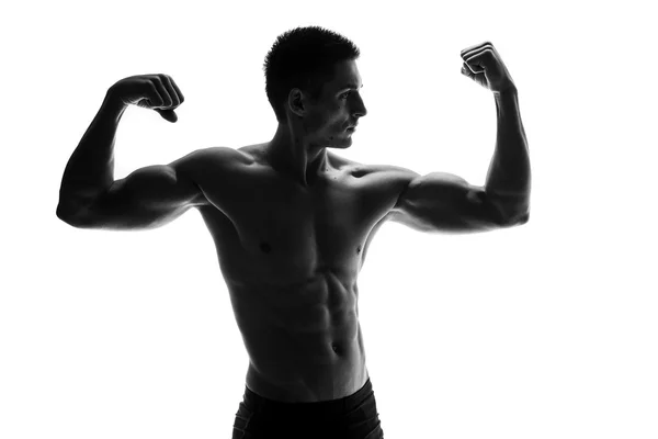 Hombre muscular aislado en blanco — Foto de Stock