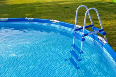 Swimmig pool in garden clipart