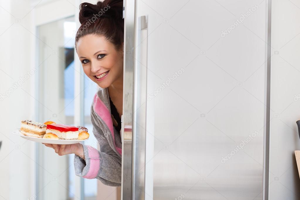 beautiful pregnant woman looking for food