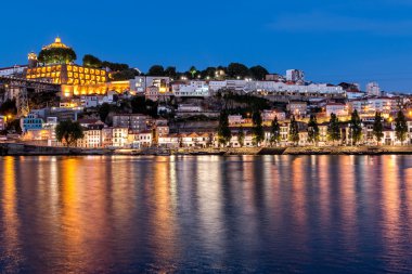 The historic centre of Porto at night clipart
