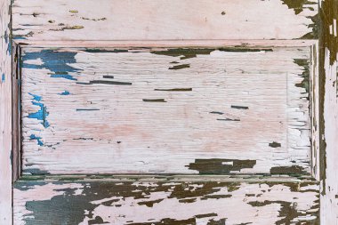 Eski yıpranmış ahşap kapı paneli.