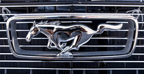 Loveland, CO - July 9,2022: Front grille of a classic antique Ford Mustang at the Loveland Classic Car Show