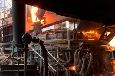 Metallurgical production. Melting of metal in an open-hearth furnace.