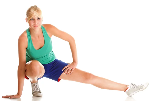 Sport Young woman doing exercise isolated on white — Stock Photo, Image