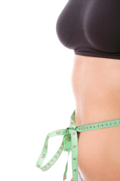 Woman slim stomach with measuring tape around it — Stock Photo, Image