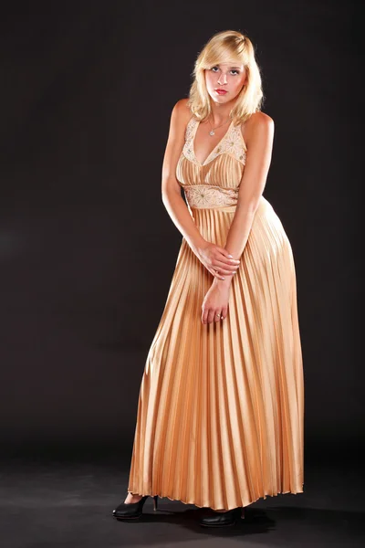 Woman blonde fashion model in yellow dress — Stock Photo, Image