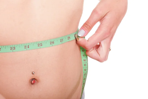 Woman slim stomach with measuring tape around it — Stock Photo, Image