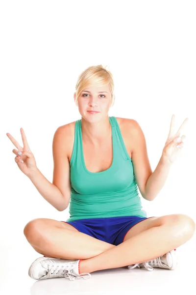 Deporte Mujer joven haciendo ejercicio aislado en blanco — Foto de Stock