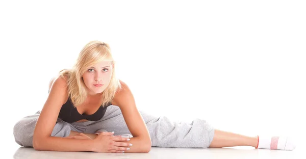 Sport Jeune femme faisant de l'exercice isolé sur blanc Photos De Stock Libres De Droits