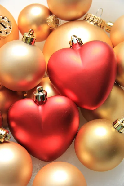 Red heart shaped christmas ornaments — Stock Photo, Image