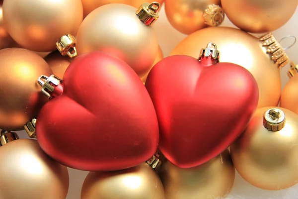Red heart shaped christmas ornaments Stock Photo
