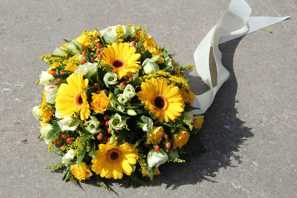 Yellow sympathy flowers