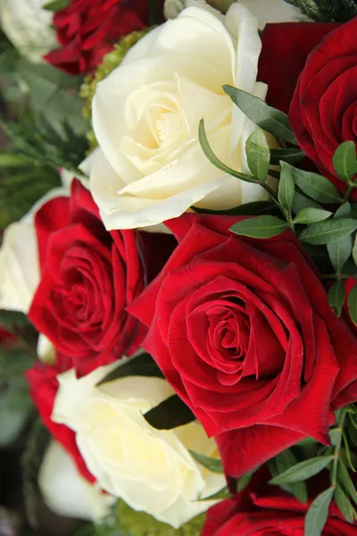 Red and white roses in a bridal bouquet — Stock Photo, Image