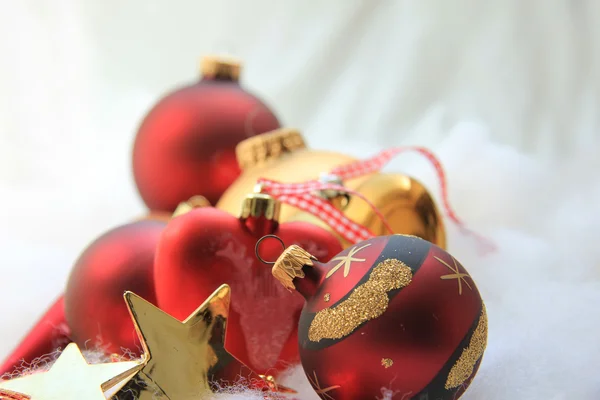 Christmas decorations in red and gold — Stock Photo, Image