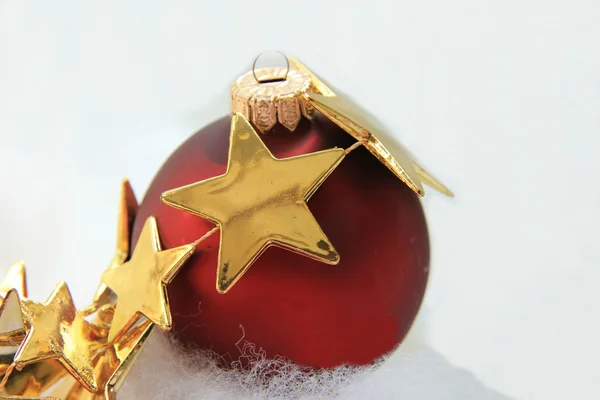 Christmas ornament and golden star — Stock Photo, Image