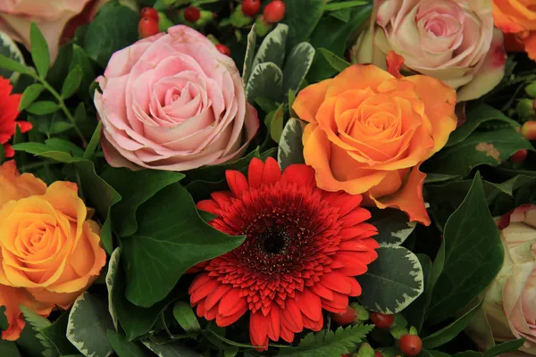 Roses and gerberas in a wedding arrangement Stock Photo