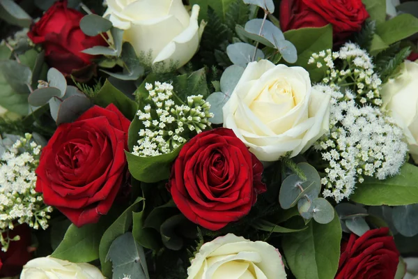 Red and white roses in a bridal bouquet — Stock Photo, Image