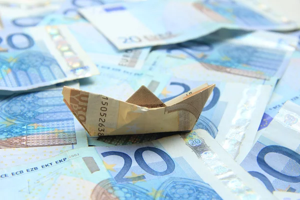 Navegando en dinero — Foto de Stock