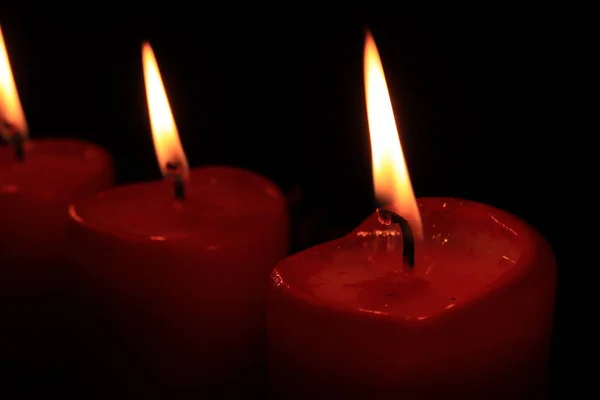 Four Red Burning Candles Row Christmas Centerpiece — Stockfoto