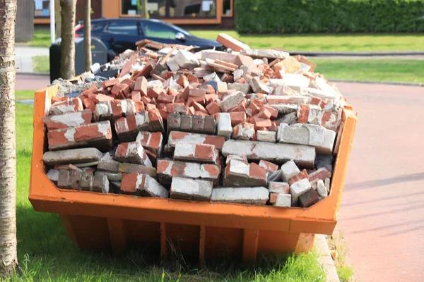 Old Demolished Bricks Orange Garbage Dumpster — Foto Stock