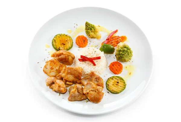 Fried chicken nuggets, white rice and vegetables — Stock Photo, Image