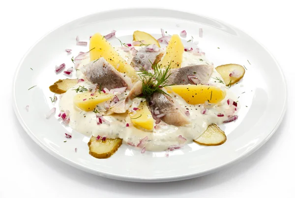 Marinated herring fillets with cream and vegetables — Stock Photo, Image