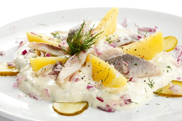 Filetes de arenque marinados com nata e legumes — Fotografia de Stock