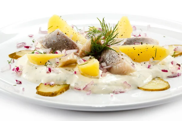 Marinated herring fillets with cream and vegetables — Stock Photo, Image