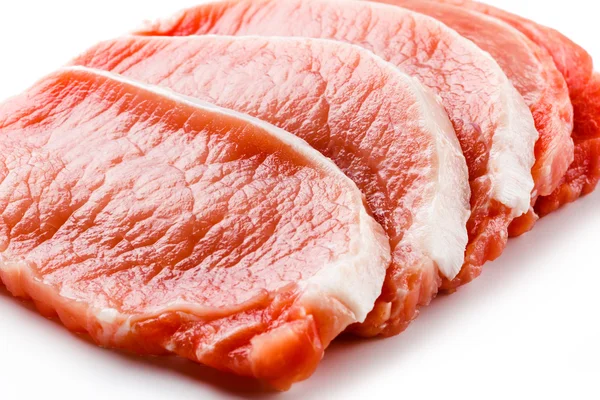 Färsk rå gris på vit bakgrund — Stockfoto