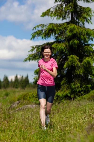Woman running, jumping outdoor — Stock Photo, Image